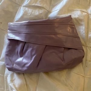 Clutch snaps shut. Interior zipper